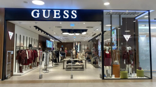 Authentic Brands completa la compra de la mayor&iacute;a de Guess, que sale de Bolsa